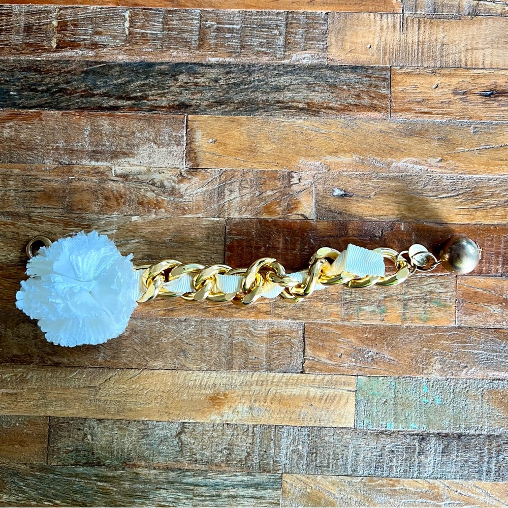 Milly Gold Tone Chain Bracelet with Ribbon & Flower